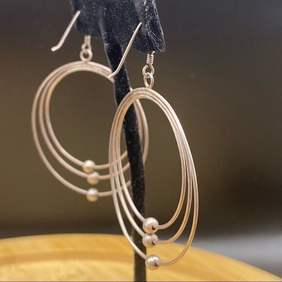 925 silver triple hoop earrings with fishhooks and are 1 3/4” long - Picture 2 of 6